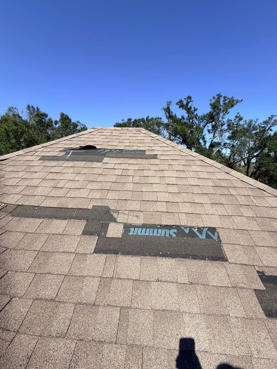 Gold Roofs crew installing a new roof on a home in The Villages, FL.