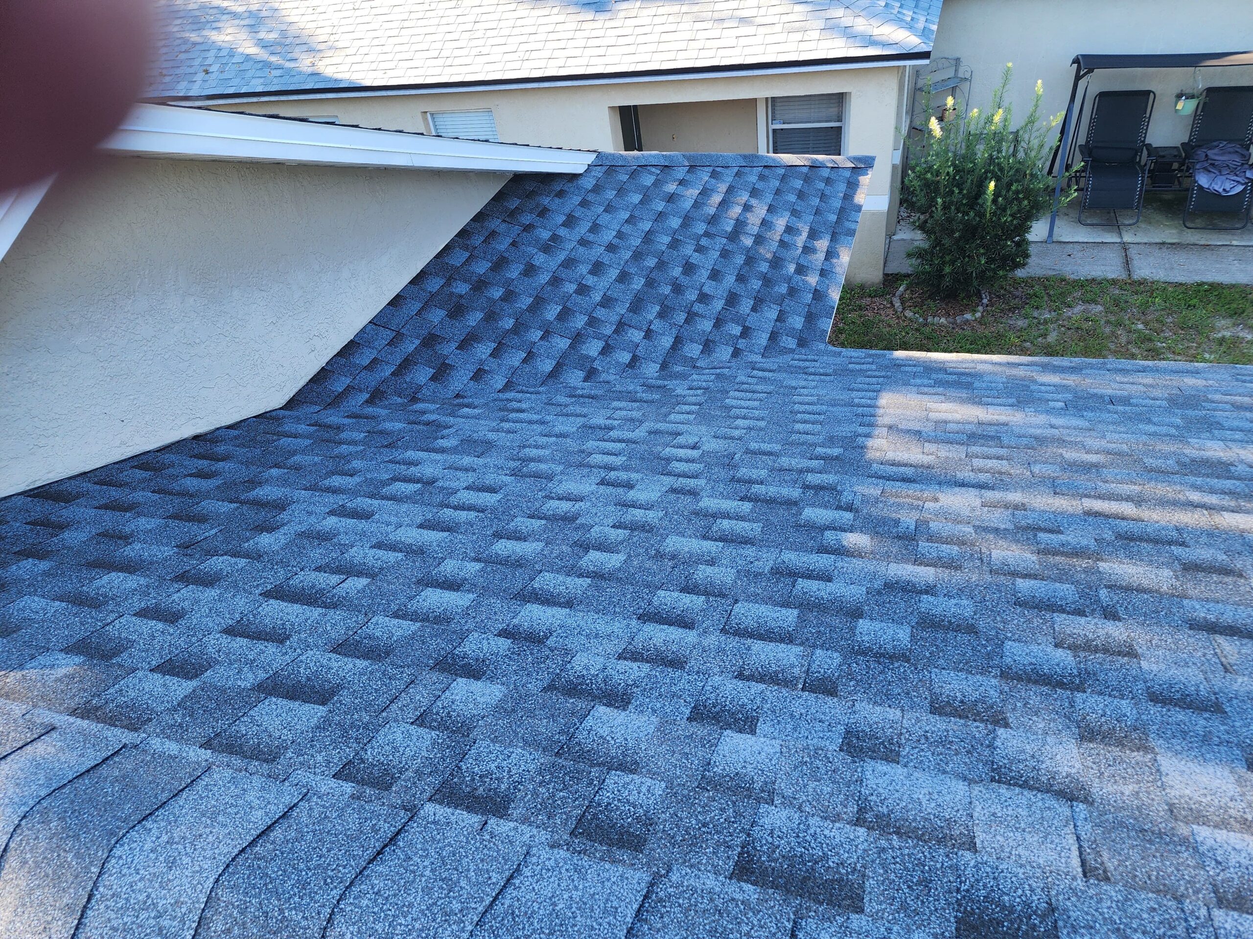 Gold Roofs crew installing a new roof on a home in Pinellas County, FL.