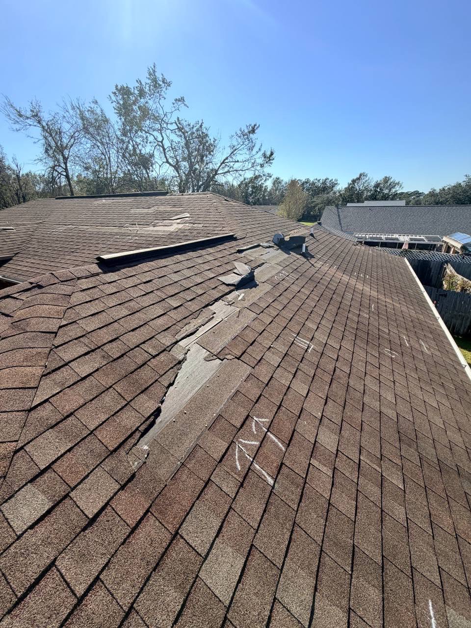 Gold Roofs team finishing a residential roof replacement near Lady Lake, FL.